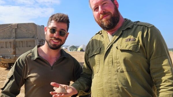 Nathaniel Melchior and Alon Segev with the lamp