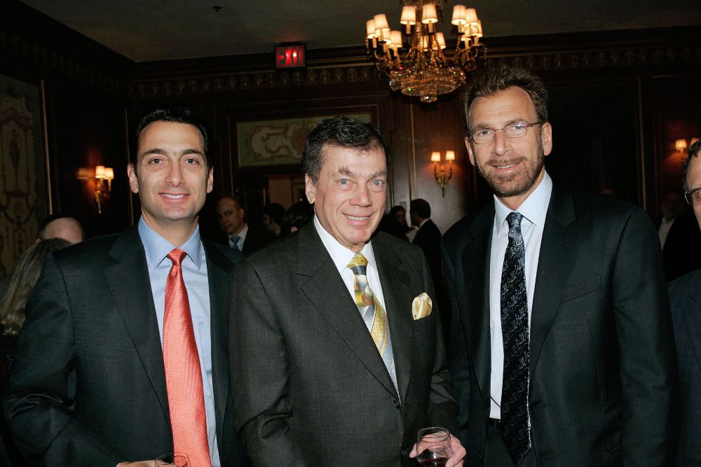 with his sons Matthew, left, and Edgar Jr., right,